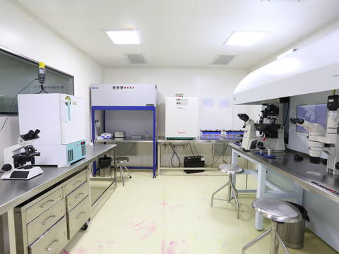 Clean-room embryology lab with microscope and incubators at Jananam Fertility Centre, Neelankarai, Chennai