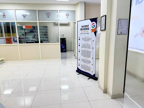 The on-site pharmacy at Jananam Fertility Centre, Thiruporur, with medicines in glass-fronted cabinets